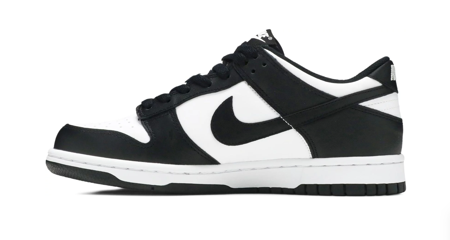 side view dunk low white black Grade school